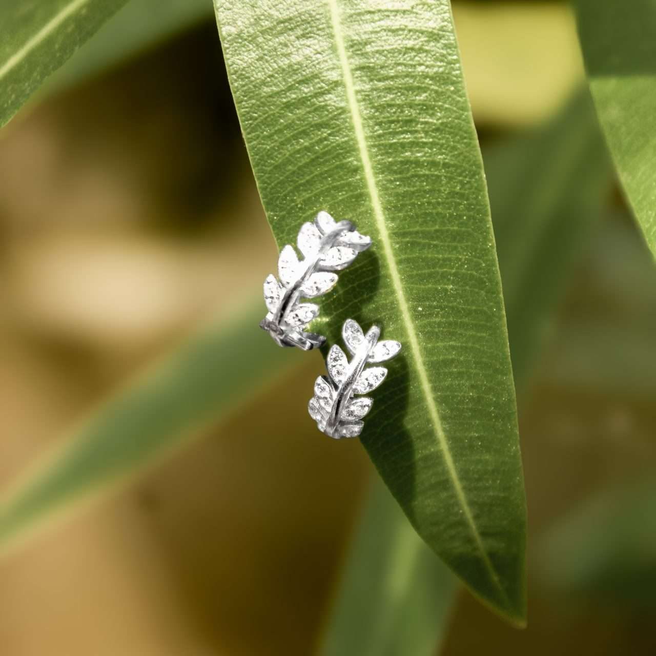 Close-Out-27309<br>huggie leaves w/ clear CZ's .925 RP - Image 3