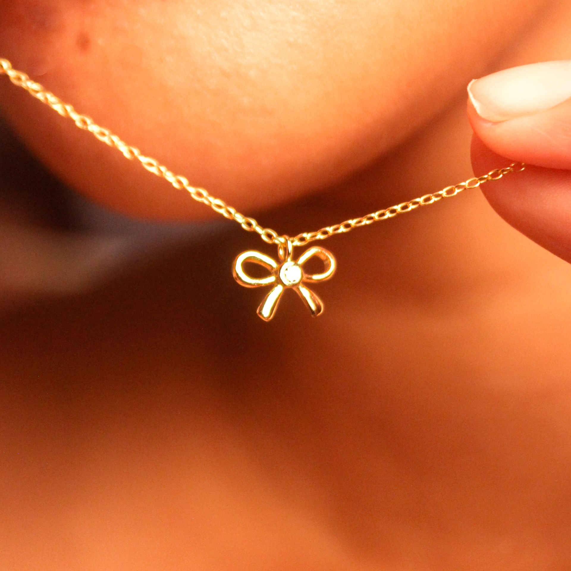 95147<br>necklace 11x8 bow w/ CZ 18" .925 GP - Image 2